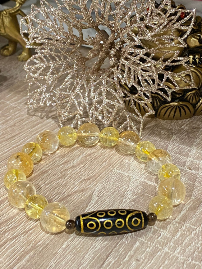 Бусина Дзи 21 глаз в браслете из цитрина