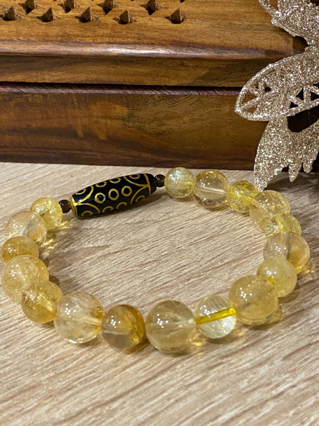 Бусина Дзи 21 глаз в браслете из цитрина