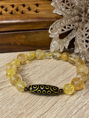 Бусина Дзи 21 глаз в браслете из цитрина Бусина Дзи 21 глаз в браслете из цитрина