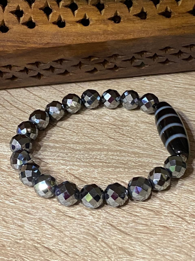 Бусина Дзи "Легкая жизнь" в браслете из терагерца граненного с фурнитурой Бусина Дзи "Легкая жизнь" в браслете из терагерца граненного с фурнитурой