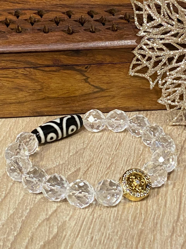 Бусина Дзи 3 глаза в браслете из граненного горного хрусталя с ваджрой