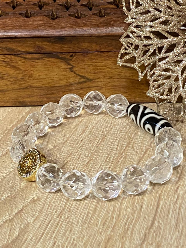 Бусина Дзи 3 глаза в браслете из граненного горного хрусталя с ваджрой