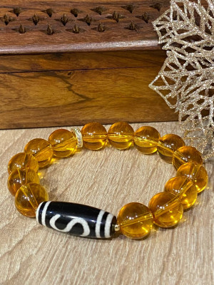 Бусина Дзи "Денежный крючок"  в браслете из цитрина