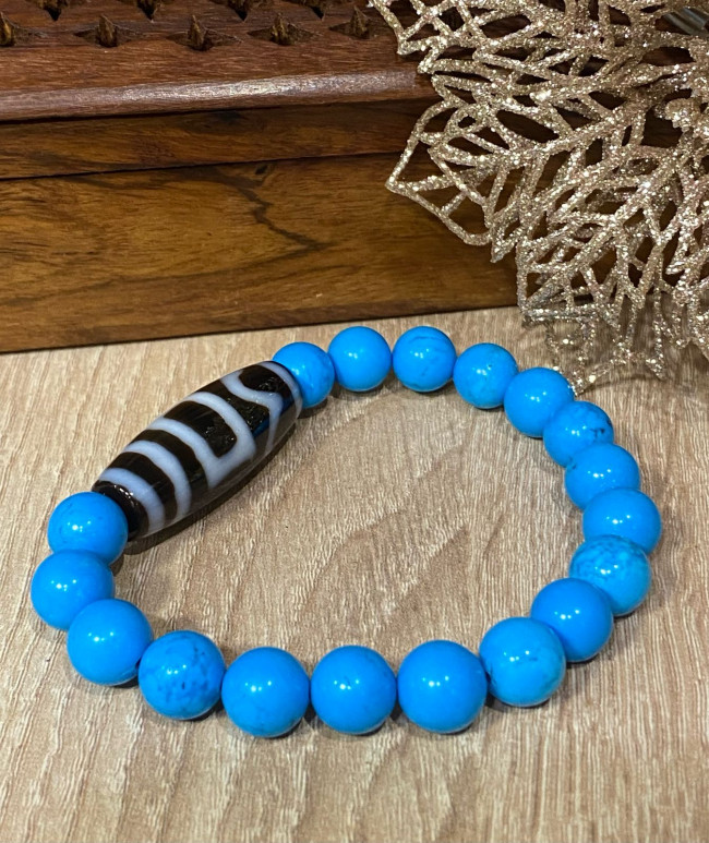 Бусина Дзи "Мир и гармония" в браслете из прессованной бирюзы, 12 мм