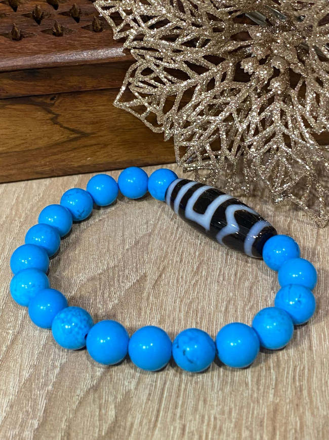 Бусина Дзи "Мир и гармония" в браслете из прессованной бирюзы, 12 мм