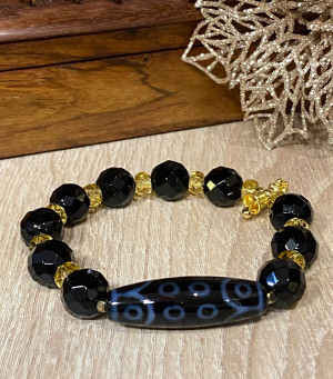 Бусина Дзи 18 глаз в браслете из цитрина и агата с защитным колокольчиком ваджра