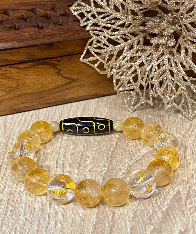 Бусина Дзи 9 глаз в браслете из цитрина с хрустальными мантрами
