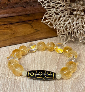 Бусина Дзи 9 глаз в браслете из цитрина с хрустальными мантрами