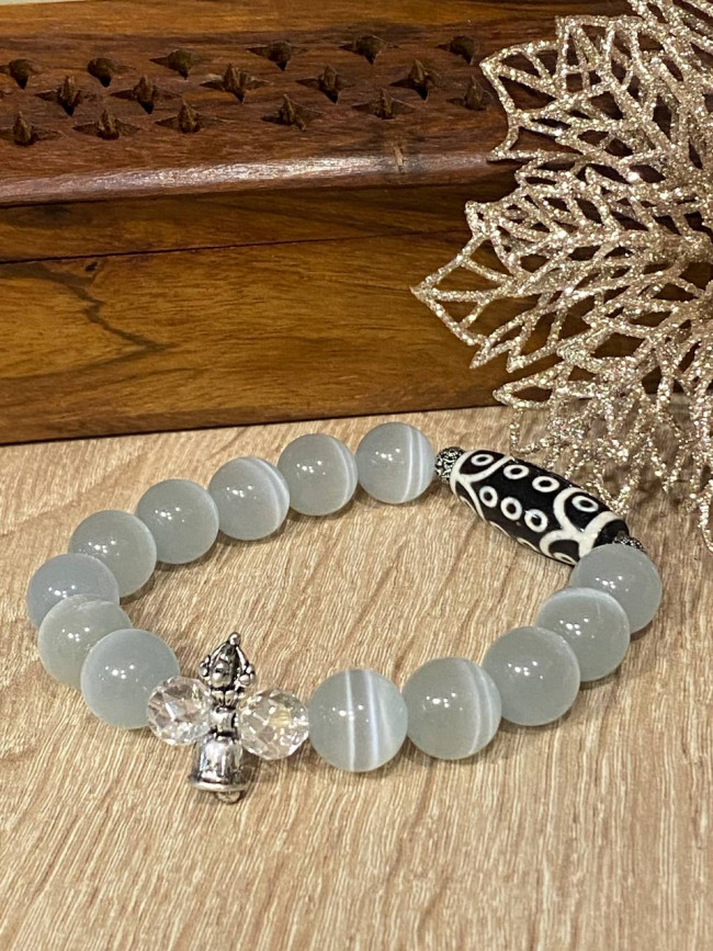 Бусина Дзи 21глаз в браслете из серого кошачьего глаза Бусина Дзи 21глаз в браслете из серого кошачьего глаза