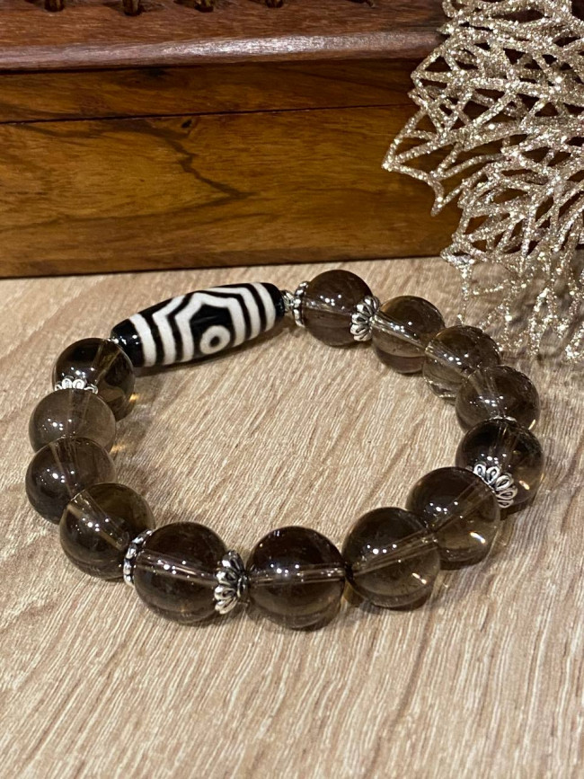 Бусина Дзи 3 глаза в браслете из раухтопаза