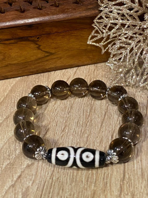 Бусина Дзи 3 глаза в браслете из раухтопаза