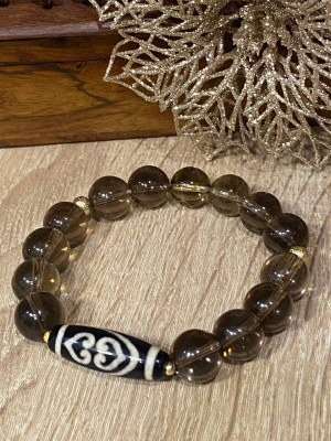 Бусина Дзи " Два сердца Будды" в браслете из раухтопаза