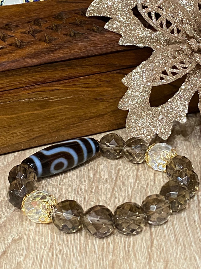 Бусина Дзи"Два глаза" в браслете из раухтопаза и кристалла Аврора