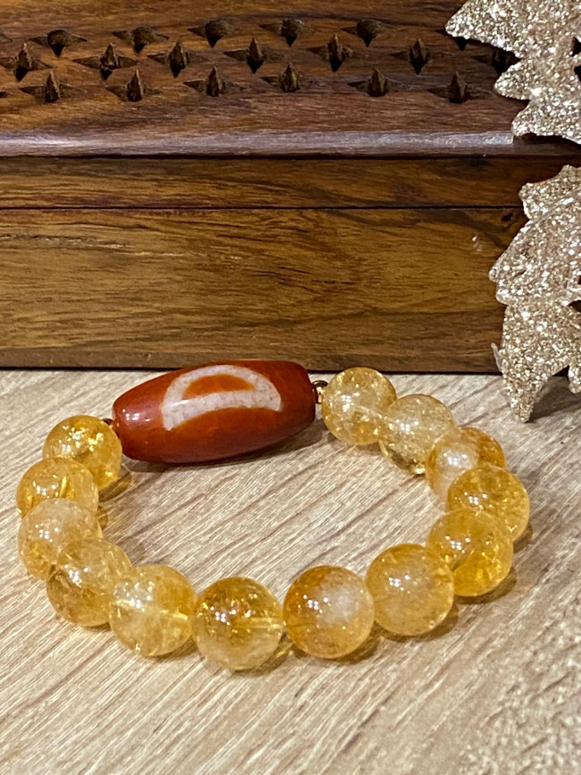 Бусина Дзи "Солнце,луна,звезда" в браслете из цитрина