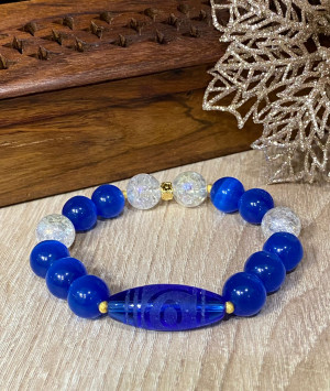 Бусина Дзи 2 глаза в браслете из синего кошачьего глаза и перламутрового сахарного кварца Бусина Дзи 2 глаза в браслете из синего кошачьего глаза и перламутрового сахарного кварца