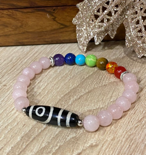 Бусина Дзи 2 глаза в браслете 7 чакр из розового кварца Бусина Дзи 2 глаза в браслете 7 чакр из розового кварца