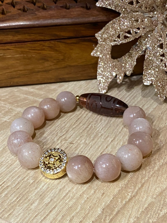 Бусина Дзи "6 глаз черепаха" в браслете из солнечного камня с ваджрой