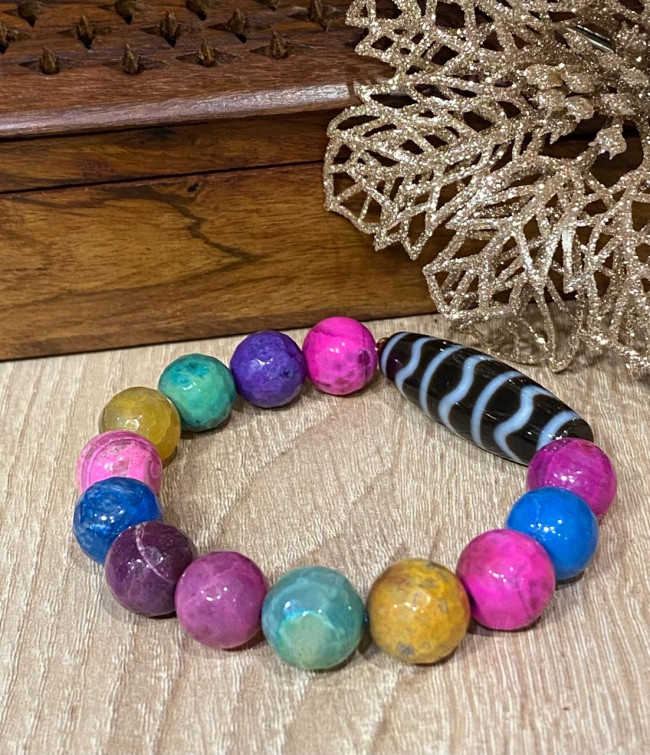 Бусина Дзи "На волне успеха" в браслете из разноцветного агата Бусина Дзи "На волне успеха" в браслете из разноцветного агата