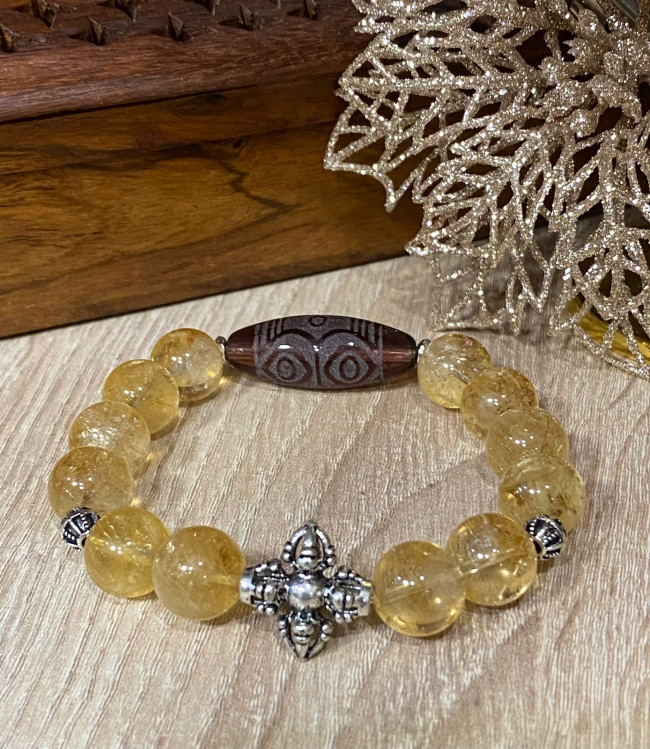 Бусина Дзи "Глаза Дракона" в браслете из цитрина с ваджрой