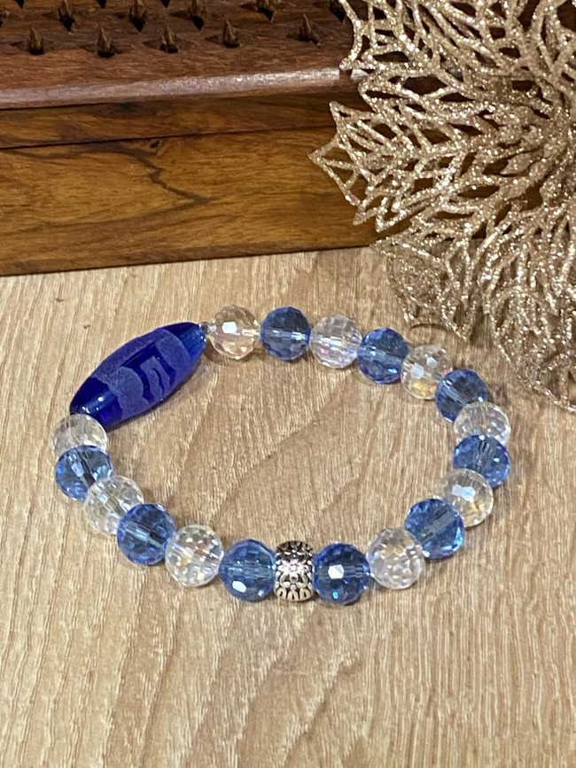 Бусина Дзи "Гаруда" в браслете из граненого хрусталя Бусина Дзи "Гаруда" в браслете из граненого хрусталя