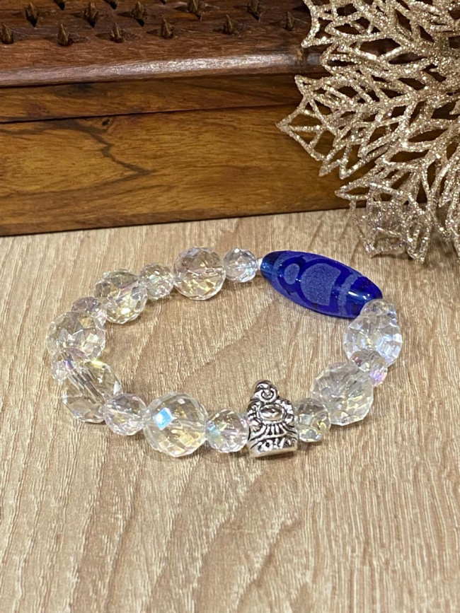 Бусина Дзи "Бог Богатства" в браслете из граненого хрусталя Бусина Дзи "Бог Богатства" в браслете из граненого хрусталя